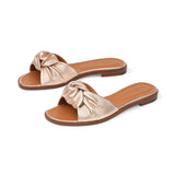 Gisele Slide in Metallic Rose Gold Leather
