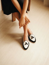 Claudia (Tassel) Loafer in Black and White Leather